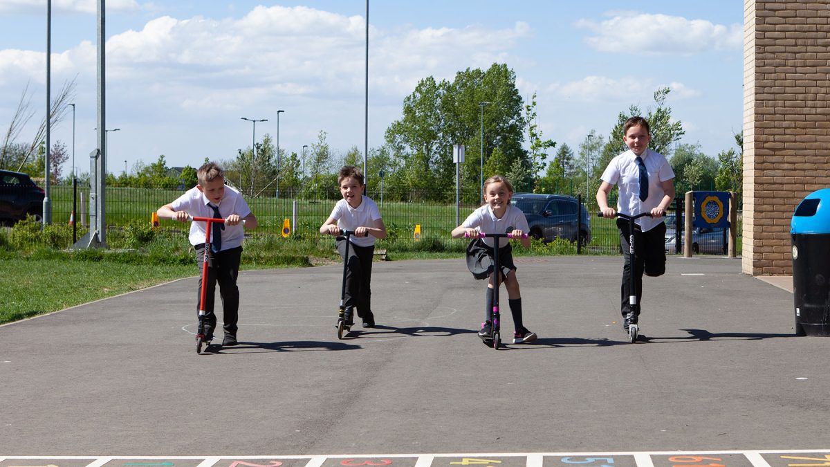 Children riding Scooters