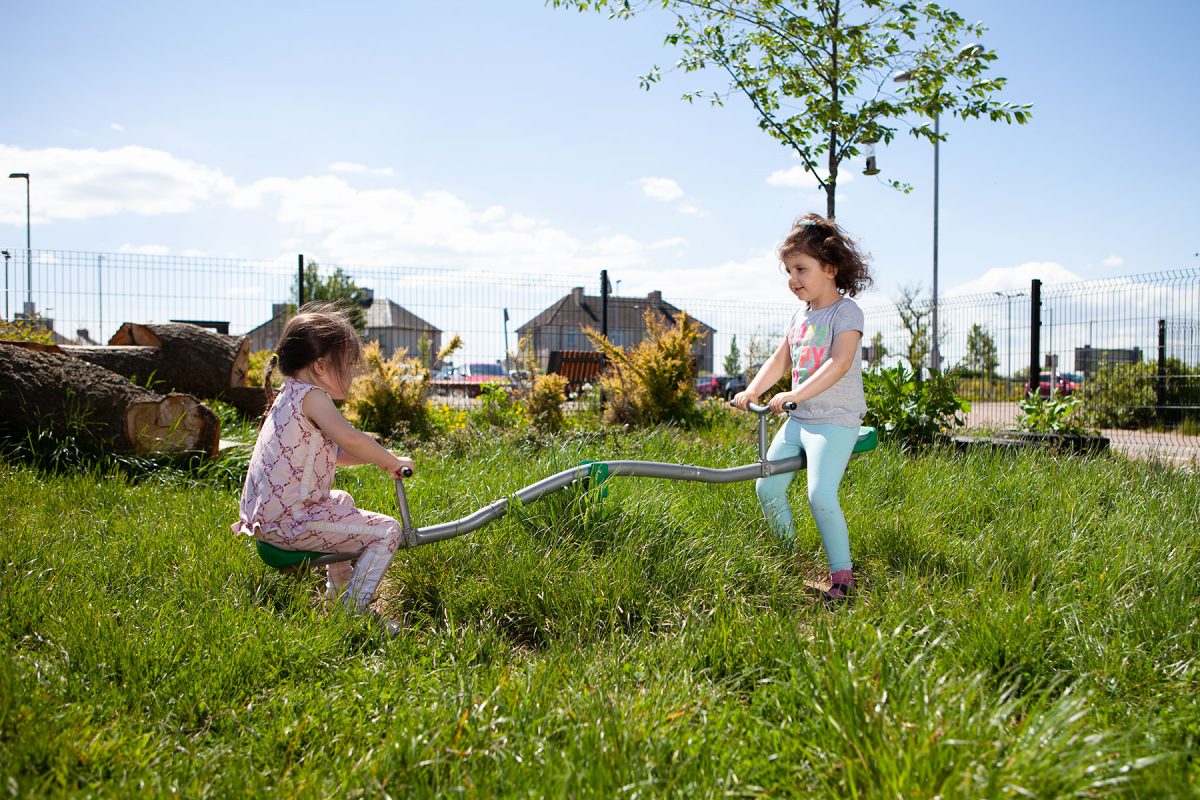 Children playing on SeeSaw